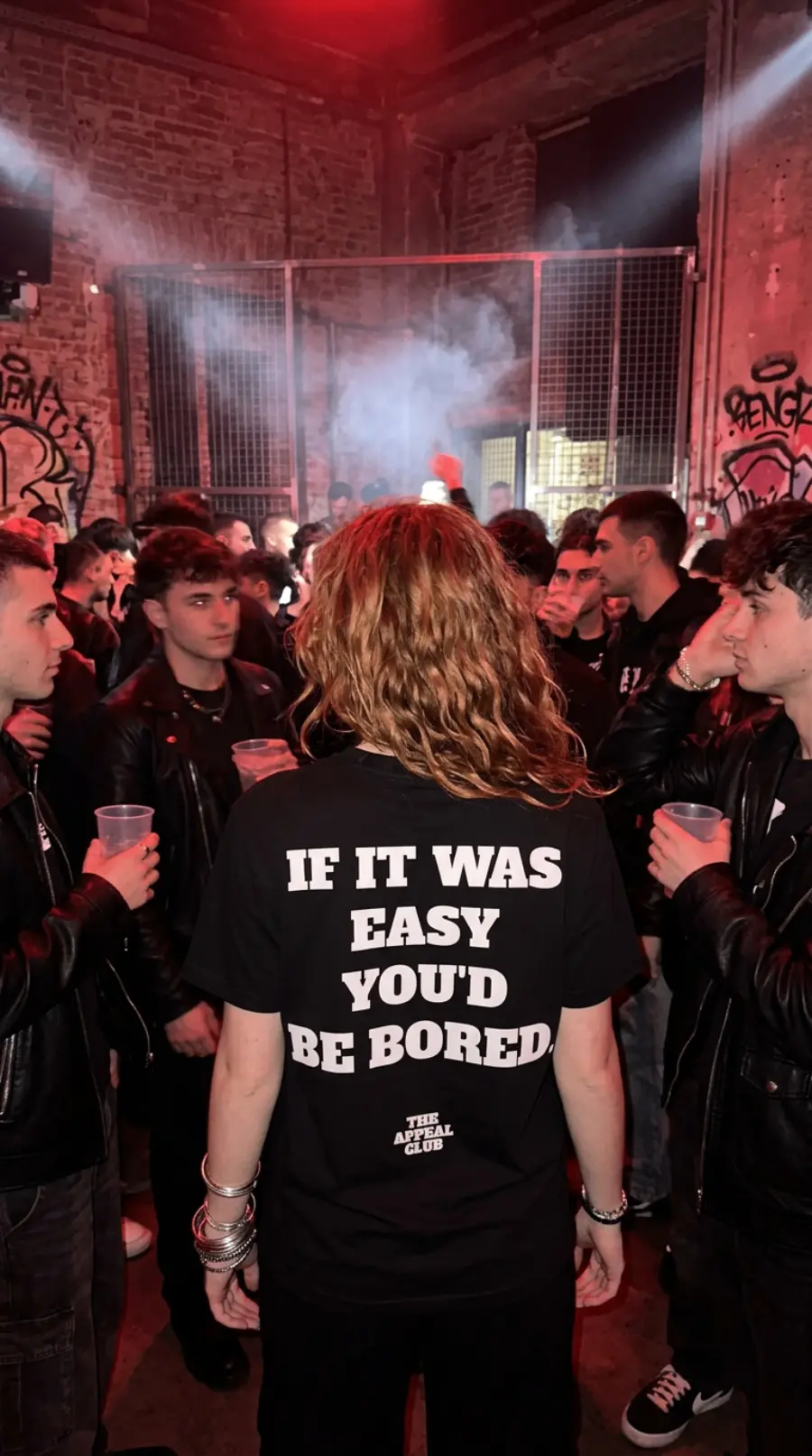 Person from behind at a venue