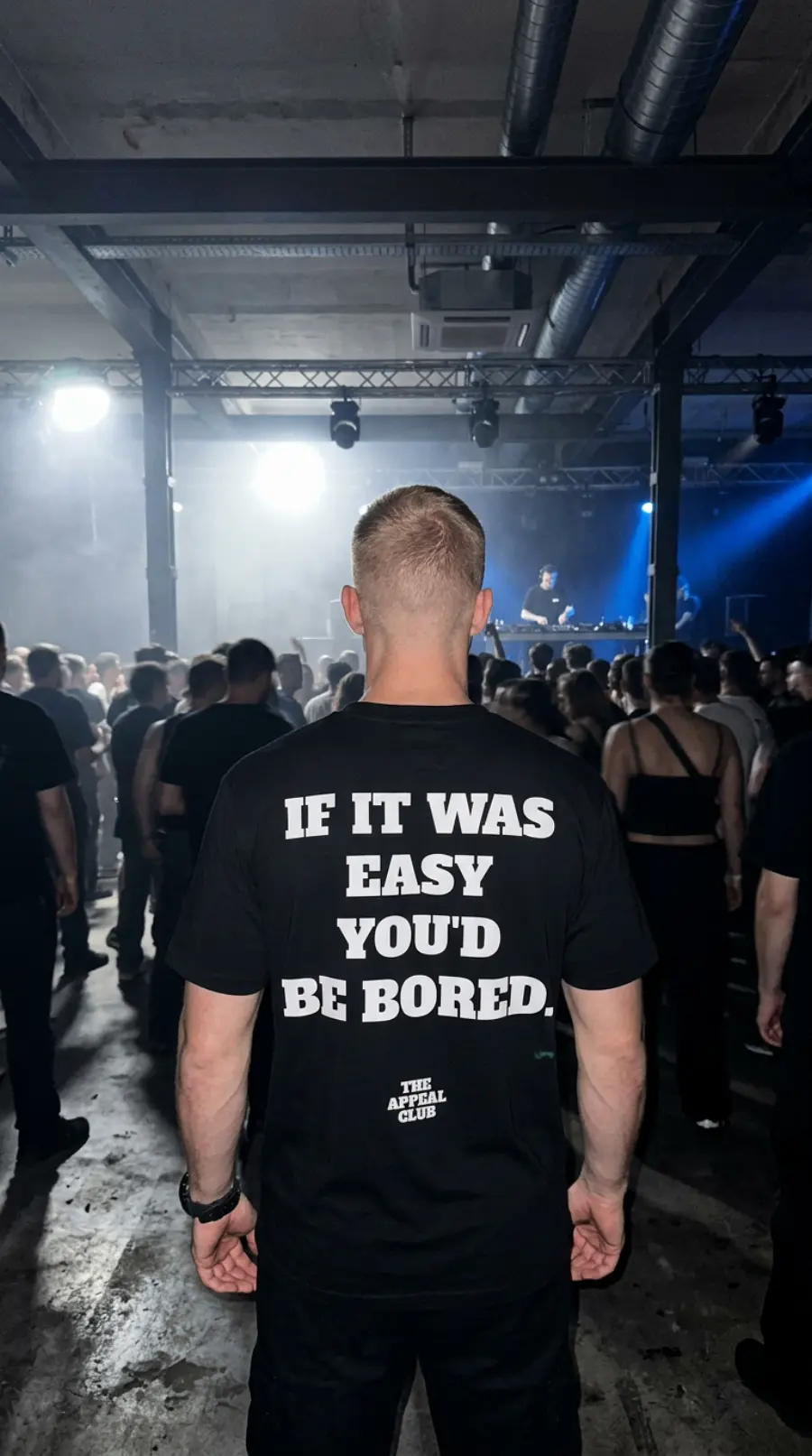 Person from behind at the DJ booth