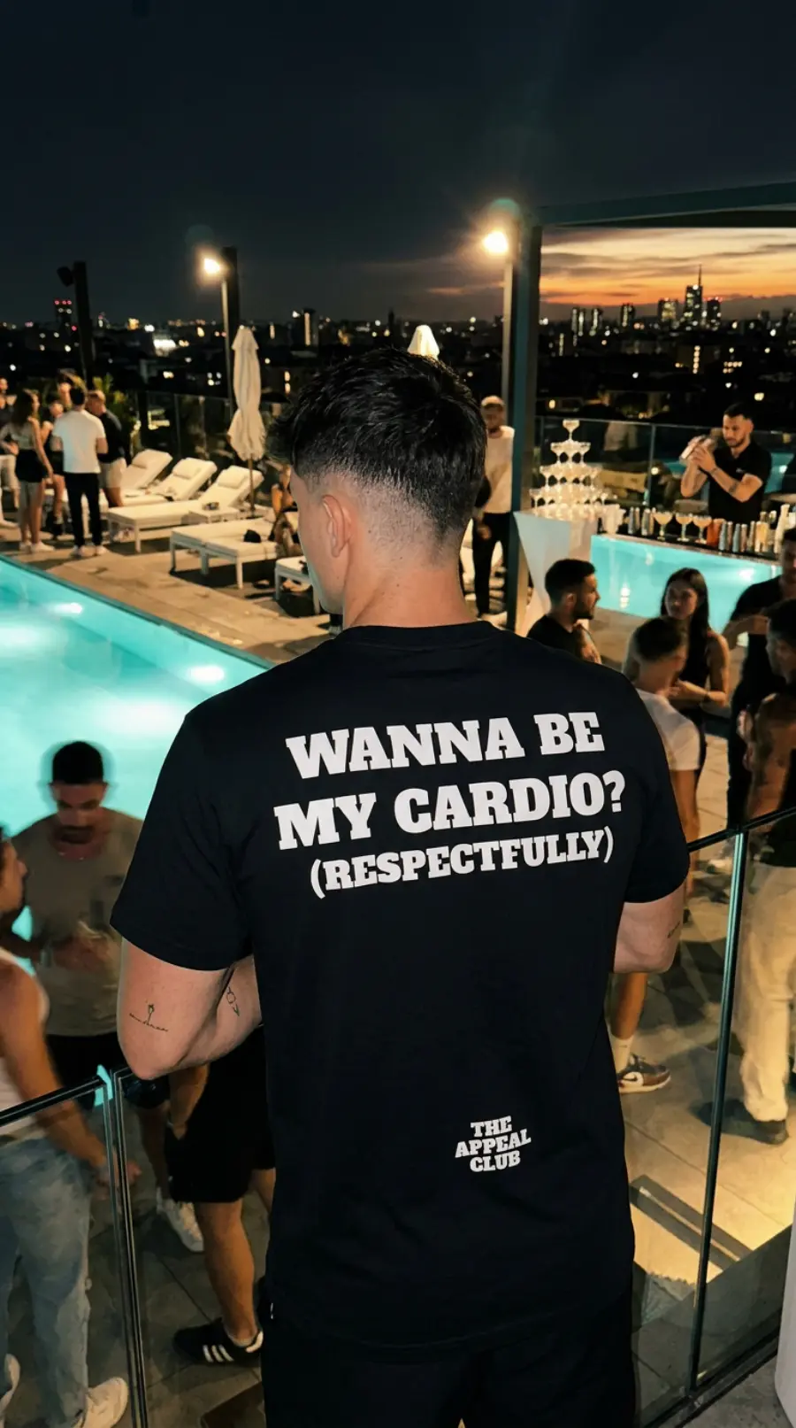 Person from behind by the pool